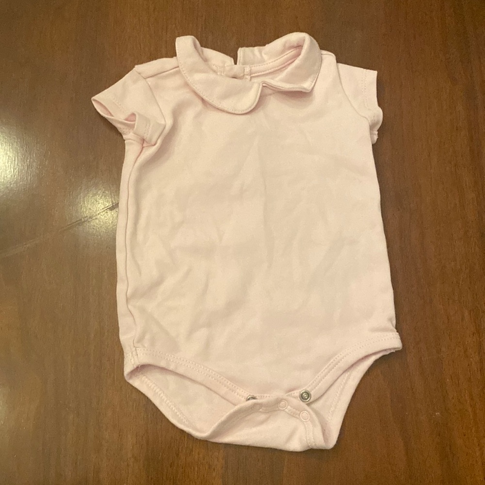 Primary light pink Peter Pan onesie
